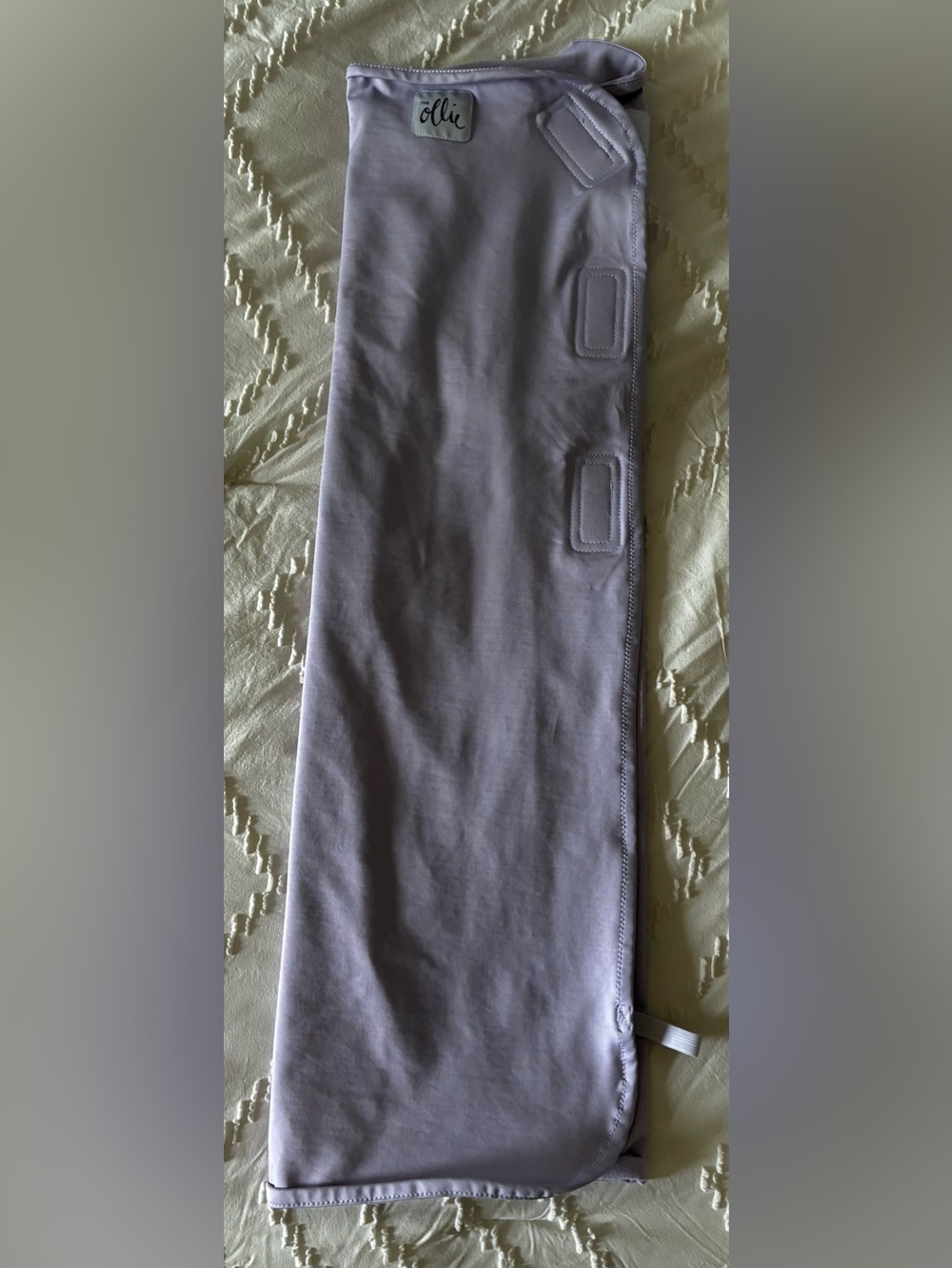 The Ollie Swaddle lavender baby blanket